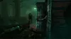 A dark, foggy forest scene with a killer and two survivors. One survivor is on the ground, and another is hiding behind a wooden structure. Produktbild-Vorschau