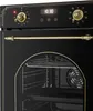 A close-up view of the control panel and interior of a black oven with gold accents. Podgląd zdjęcia produktu