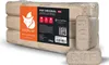 A stack of wood briquettes with packaging and two loose briquettes in the foreground. Produktbild-Vorschau