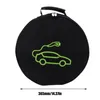 A black circular bag with a green outline of an electric car and charging cable printed on it. A measurement indicator is shown below the bag. Podgląd zdjęcia produktu