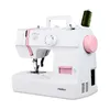 A white Medion sewing machine with pink accents and a spool of green thread on a white background. Produktbild-Vorschau
