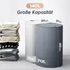A stack of folded clothes next to two cylindrical laundry baskets, with dimensions and capacity indicated. Podgląd zdjęcia produktu