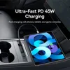 A tablet is being charged in a car's center console. Voir les images du produit