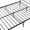 Close-up view of a black metal bed frame. Voir les images du produit