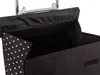 A close-up view of the interior of a black shopping bag with white polka dots on the side. Anteprima dell’immagine prodotto