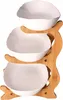 A three-tiered serving stand made of bamboo with white ceramic bowls. Náhled obrázku produktu
