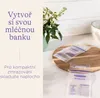A close-up of breast milk storage bags on a wooden cutting board, with a plant in the background. Podgląd zdjęcia produktu