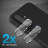 A close-up view of two camera lens protectors placed on the back of a black smartphone. Produktbild-Vorschau