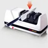 A knife sharpener with a knife being sharpened. Produktbild-Vorschau