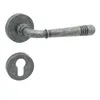 A door handle set with a keyhole escutcheon, presented against a white background. Produktbild-Vorschau