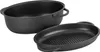 A black oval cast iron roaster with a lid that doubles as a grill pan, shown on a white background. Náhled obrázku produktu