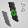 A black smartphone is shown with a green glowing charging coil on its back, next to a gray flat object, likely a wireless charger. Produktbild-Vorschau