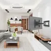 A modern living room and dining area with a TV mounted on the wall. Produktbild-Vorschau