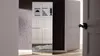 A mirrored wardrobe in a room with a door slightly ajar. Produktbild-Vorschau