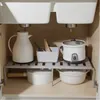 Under-sink cabinet organizer with kitchenware. Produktbild-Vorschau