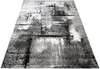 A modern abstract rug with black, gray, and white patterns. Produktbild-Vorschau