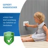 A child is reaching for an electrical outlet, with safety warnings and certifications displayed. Anteprima dell’immagine prodotto