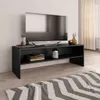 A black TV stand with a television and decorative items on it, placed on a wooden floor with a rug in front. Náhľad obrázku produktu