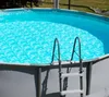 An above-ground swimming pool with a ladder. Produktbild-Vorschau