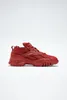 A red Reebok sneaker is shown against a white background. Voir les images du produit