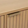 A close-up view of a wooden cabinet with a brass handle. Podgląd zdjęcia produktu