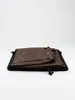 A folded brown dog crate is shown against a white background. Produktbild-Vorschau