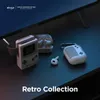 A collection of retro-styled tech accessories, including an Apple Watch case and AirPods cases, displayed on a dark surface. Voir les images du produit