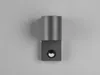 A modern gray wall lamp with a cylindrical top and a square base containing a black sensor. Produktbild-Vorschau