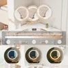 A vanity mirror with LED lighting, showing different light settings and color temperatures. Produktbild-Vorschau
