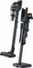 A dark-colored vacuum cleaner and its charging stand are shown against a white background. Produktbild-Vorschau
