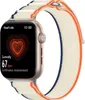 A close-up of a smartwatch with a heart rate monitor displayed on the screen, attached to a fabric strap. Náhled obrázku produktu