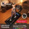 A woman is running on a treadmill in a living room, with various marketing overlays and text. Produktbild-Vorschau