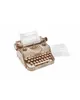 A wooden model of a typewriter with paper inserted. Podgląd zdjęcia produktu