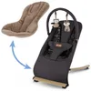 A baby bouncer with an additional cushion shown separately, with a blue arrow indicating it can be attached. Produktbild-Vorschau