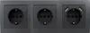 A close-up studio shot of a black electrical outlet strip with three sockets and two USB ports. Produktbild-Vorschau