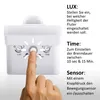 A hand is shown pressing a button on a white motion sensor device, with text explaining its features. Produktbild-Vorschau