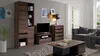 A living room scene featuring a modular furniture set including a tall cabinet, a TV stand with a television, and a chest of drawers, along with a coffee table and a sofa. Anteprima dell’immagine prodotto
