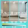 Three different lighting conditions of a living room with a white sofa. Náhled obrázku produktu