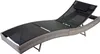 A grey and black chaise lounge is shown against a white background.