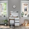 A vanity table with a stool and mirror in a room with two windows. Náhled obrázku produktu