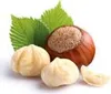 A close-up of hazelnuts with leaves. Produktbild-Vorschau
