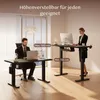 Two people using height-adjustable desks in a modern office setting. Produktbild-Vorschau