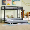 A children's bedroom with a black metal bunk bed with a trundle bed, decorated with colorful artwork and toys. Podgląd zdjęcia produktu