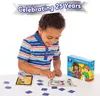 A young boy is playing a board game called "Shopping List" on a white table. Anteprima dell’immagine prodotto