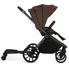 A side view of a brown stroller with a black buggy board attached. Náhľad obrázku produktu
