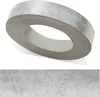 A roll of decorative edge banding with a concrete/stone pattern, shown with a close-up of the pattern below. Produktbild-Vorschau