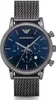 A close-up, front-facing studio shot of a men's wristwatch with a blue dial and a dark gray mesh band. Voir les images du produit