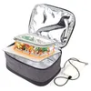A heated lunch bag with a glass food container inside, connected to a power bank. Náhľad obrázku produktu