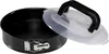 A black springform cake pan with a clear plastic lid and black handle is shown on a white background. Produktbild-Vorschau