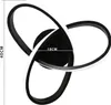 A modern black LED ceiling light with three intertwined rings, featuring dimensions indicated by text overlays. Produktbild-Vorschau